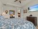 Comfortable bedroom with king bed and views into the kitchen at 1575 N River Cir, Tarpon Springs, FL 34689