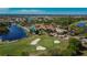 Expansive view of the golf course and clubhouse at 1649 Emerald Dunes Dr, Sun City Center, FL 33573