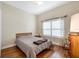 Cozy bedroom with hardwood floors and window seating at 1649 Emerald Dunes Dr, Sun City Center, FL 33573