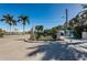 Ornate entrance to Bay Aristocrat Village with festive decor at 18675 Us Highway 19 N # 364, Clearwater, FL 33764