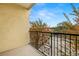 Spacious balcony with metal railing offering a view of the neighborhood at 1910 E Palm Ave # 8214, Tampa, FL 33605