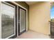 Balcony with double doors and a view of the surrounding area at 1910 E Palm Ave # 8214, Tampa, FL 33605