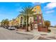 Brick building exterior with palm trees and street view at 1910 E Palm Ave # 8214, Tampa, FL 33605