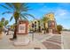 Brick building exterior with palm trees and street view at 1910 E Palm Ave # 8214, Tampa, FL 33605