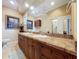 Double vanity bathroom with granite countertop at 1962 Freedom Dr, Clearwater, FL 33755