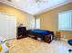 Bedroom with double bed and built-in shelving at 1962 Freedom Dr, Clearwater, FL 33755