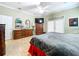 Bright bedroom with king-size bed and access to the outside at 1962 Freedom Dr, Clearwater, FL 33755