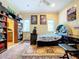 Spacious bedroom with ensuite bathroom and bookcases at 1962 Freedom Dr, Clearwater, FL 33755