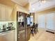 Spacious kitchen with stainless steel appliances and breakfast nook at 1962 Freedom Dr, Clearwater, FL 33755