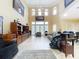 Spacious living room with high ceilings and large windows at 1962 Freedom Dr, Clearwater, FL 33755