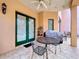 Relaxing patio with seating area and built-in grill at 1962 Freedom Dr, Clearwater, FL 33755