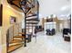 Elegant spiral staircase leading to upper levels at 1962 Freedom Dr, Clearwater, FL 33755