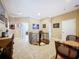 Open upper hallway showcasing a spiral staircase and sitting area at 1962 Freedom Dr, Clearwater, FL 33755