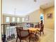 Upper hallway with a charming sitting area and views below at 1962 Freedom Dr, Clearwater, FL 33755