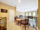 Lovely upper hall with seating area overlooking the living room at 1962 Freedom Dr, Clearwater, FL 33755