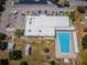 Aerial view showing pool, building, and parking at 2071 Australia W Way # 17, Clearwater, FL 33763