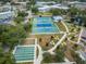 Aerial view of tennis courts, shuffleboard, and picnic areas at 2071 Australia W Way # 17, Clearwater, FL 33763