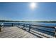 Wooden dock offers tranquil lake views at 2071 Australia W Way # 17, Clearwater, FL 33763