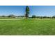 Expansive grassy area of the golf course at 2071 Australia W Way # 17, Clearwater, FL 33763