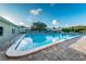 Refreshing community pool with ample deck space for lounging at 2071 Australia W Way # 17, Clearwater, FL 33763