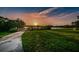 Beautiful sunset over the lake and walking path at 2071 Australia W Way # 17, Clearwater, FL 33763