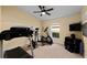 Home gym with treadmill, elliptical, and exercise equipment at 2102 Golf Manor Blvd, Valrico, FL 33596