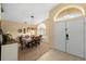 Bright dining room with a wooden table and six chairs at 2102 Golf Manor Blvd, Valrico, FL 33596