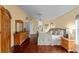 Main bedroom with wood furniture and view of the Primary bathroom at 2102 Golf Manor Blvd, Valrico, FL 33596