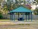 Park picnic pavilion with table and benches at 2102 Golf Manor Blvd, Valrico, FL 33596