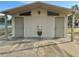 Restrooms with water fountain, light gray block exterior at 2102 Golf Manor Blvd, Valrico, FL 33596