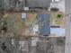 Aerial view of the house and surrounding property at 2104 W Okaloosa Ave, Tampa, FL 33604