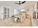 Main bedroom with light flooring and neutral decor at 2142 Hickory Gate W Dr, Dunedin, FL 34698