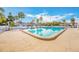 Inviting community pool with lounge chairs at 231 S Mcmullen Booth Rd # 54, Clearwater, FL 33759