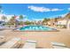 Inviting community pool with lounge chairs and picnic tables at 231 S Mcmullen Booth Rd # 54, Clearwater, FL 33759