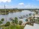 Waterfront property with community pool, boat docks, and city skyline at 2424 W Tampa Bay Blvd # L102, Tampa, FL 33607