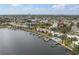 Aerial view showing waterfront location, community pool, and boat docks at 2424 W Tampa Bay Blvd # L102, Tampa, FL 33607