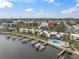 Aerial view of waterfront condo community with pool and boat slips at 2424 W Tampa Bay Blvd # L102, Tampa, FL 33607