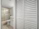 Small bathroom with shower/tub combo and white vanity at 2424 W Tampa Bay Blvd # L102, Tampa, FL 33607