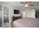 Main bedroom with TV, dresser, and walk-in closet at 2424 W Tampa Bay Blvd # L102, Tampa, FL 33607