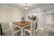 Open concept dining area with kitchen and entryway views at 2424 W Tampa Bay Blvd # L102, Tampa, FL 33607