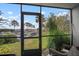 Screened lanai overlooking the marina and water at 2424 W Tampa Bay Blvd # L102, Tampa, FL 33607