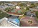 Well-maintained community tennis courts with surrounding landscape at 2424 W Tampa Bay Blvd # L102, Tampa, FL 33607