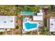 Complex overview, pool, shuffleboard, and surrounding buildings at 2750 E Bay Dr # 3B, Largo, FL 33771