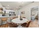 Modern dining room with white quartz table and leather chairs at 2860 4Th S Ave, St Petersburg, FL 33712