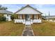 Cute bungalow with a front porch and walkway at 2860 4Th S Ave, St Petersburg, FL 33712