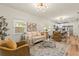 Bright living room with comfy seating and wood floors at 2860 4Th S Ave, St Petersburg, FL 33712