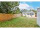 Backyard with guest house, shed, and fence at 310 W Hilda St, Tampa, FL 33603