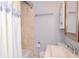 Clean bathroom with a shower/tub combo and vanity at 310 W Hilda St, Tampa, FL 33603