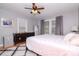 Bright bedroom with a queen bed and dresser at 310 W Hilda St, Tampa, FL 33603