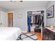 Bedroom closet with ample hanging space and shelves at 310 W Hilda St, Tampa, FL 33603